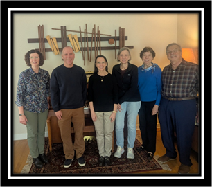 A group of people posing for a photo

AI-generated content may be incorrect.